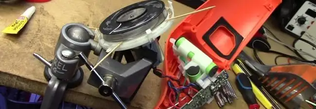 Vacuum cleaner repair parts and tools on a workbench in Pasadena, CA